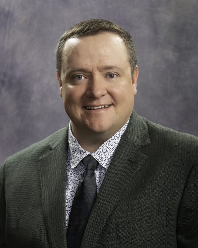 Portrait of Derek J. Harvey