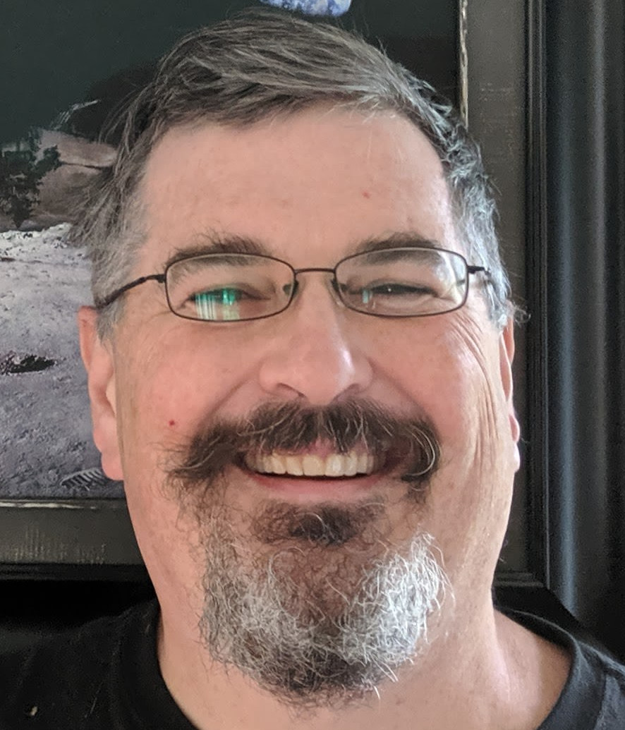 Portrait of Travis Corcoran