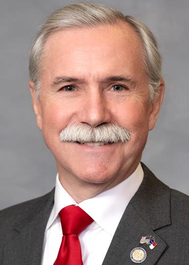 Portrait of Dennis Riddell