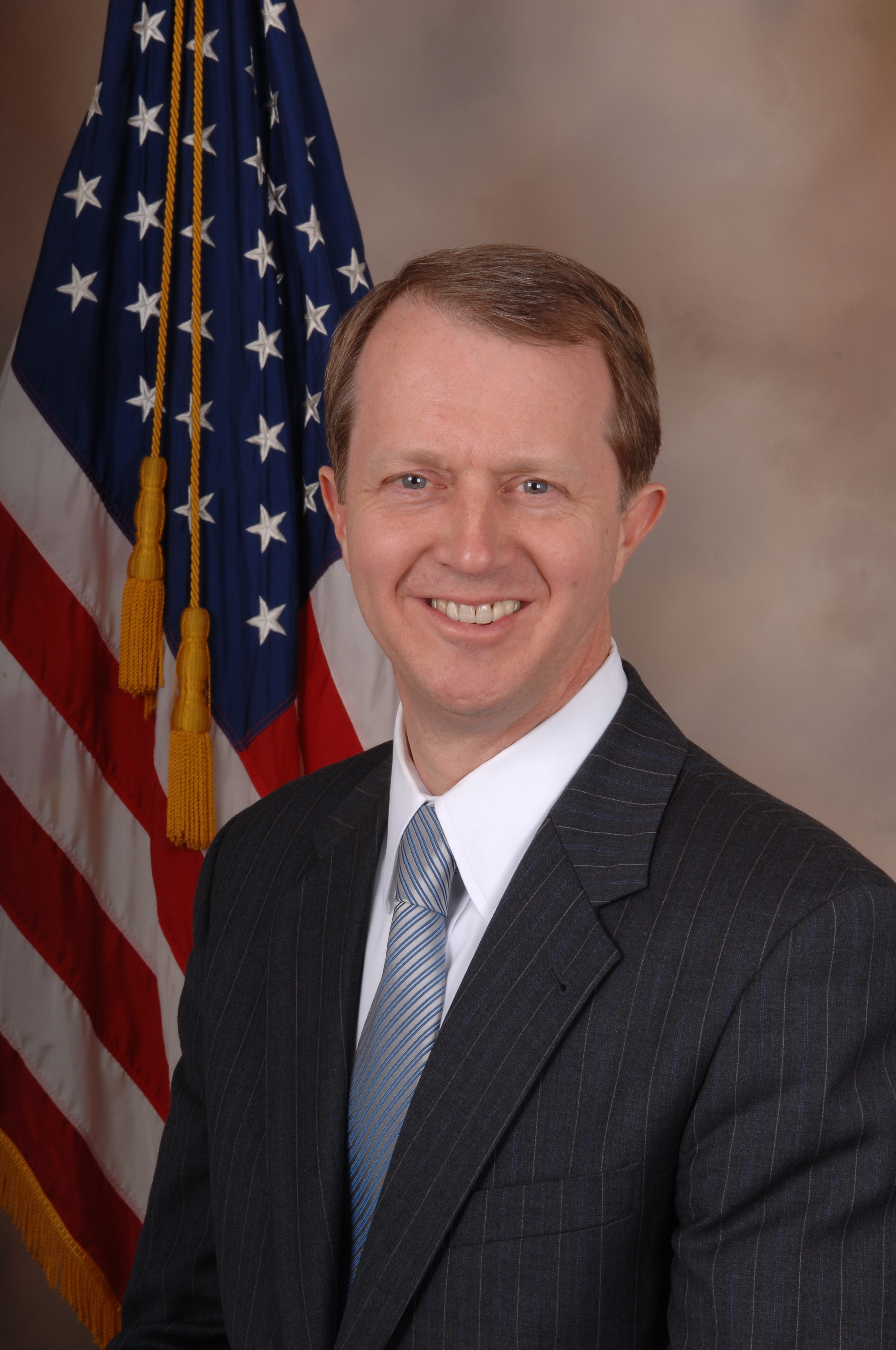 Portrait of John Adler