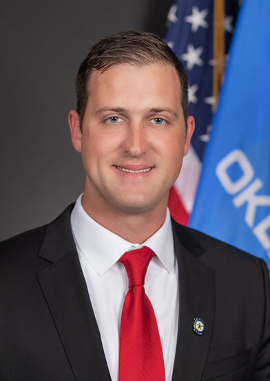 Portrait of Tom Woods