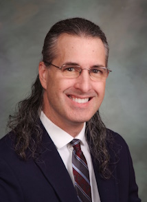 Portrait of Tom Kelly